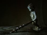 VINTAGE  BRONAST ODPIRAČ DEČKA