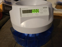 Aparat za štetje in sortiranje drobiža