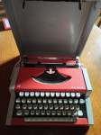 Pisalni stroj UNIS