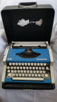 Retro pisalni stroj UNIS Sarajevo s kovčkom prodam