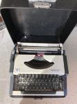 Starinski pisalni stroj UNIS tbm de Luxe
