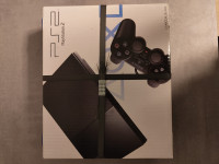 Sony Playstation 2 Slim - TOVARNIŠKO ZAPAKIRAN