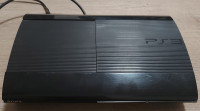 PlayStation 3 + 2 kontrolerja + volan + video igre