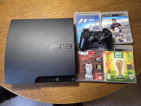 Playstation 3 slim s kontrolerjem in igrami