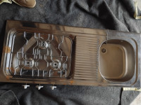 Ŝtedilnik za avtodom ali turistično prikolico