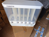 Nostimo stenski dozator suhe hrane in kosmičev