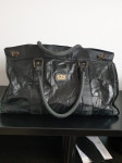 Črna usnjena potovalna torba Marc Chantal