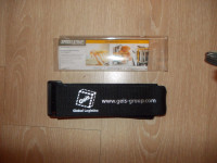 Pas za zaklepanje ali učvrstitev kovčka ali torbe