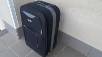 Potovalni kovček in potovalna torba na kolesih