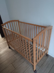 Prenosna posteljica na koleščkih