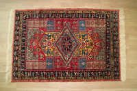 perzijska preproga ročno delo (Handmade Persian rug)