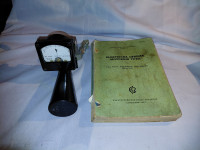 Knjiga (priročnik) in voltmeter