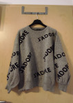 Ženski siv pulover z napisi M/L