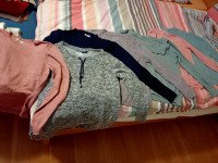 7 brezhibnih ženskih puloverjev velikost 40/42 za simbolično ceno