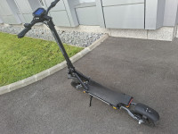 Električni skiro 1000W, domet 55km, hitrost 50km/h.