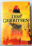 PLAYING WITH FIRE Tess Gerritsen