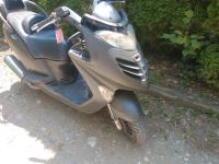 Kymco 2006 250 cm3 deli po delih rezervni deli