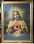 Slika Jezusa v zastekljenem lesenem okvirju