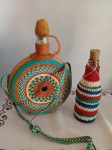 Čutari (steklenici) v pletenem ovoju