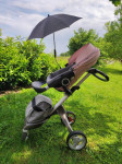 Otroški voziček Stokke (roza in siva)