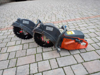 Ročna žaga Husqvarna za beton asfalt cevi. Bager demper valjar
