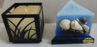 Sveča v kovinski škatli in unikatna sveča s školjkami