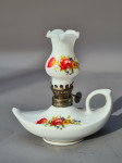 Majhen porcelanast svečnik na petrolej