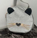 TORBICA / NAHRBTNIK MUCA