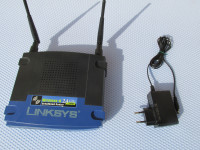 Prodam brezžični usmerjevalnik router LINKSYS WRT 54GL by CISCO