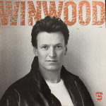 Steve Winwood – Roll With It  LP vinil očuvanost VG+ VG+