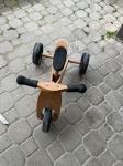 Prodam rabljen lesen otroški tricikel