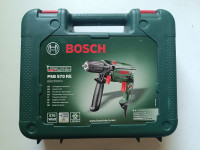 Bosch PSB 570 RE električni udarni vrtalnik v kovčku + podaljšek