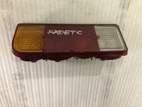 KADETT C zadnja leva luč OPEL zadaj levo 0311464600