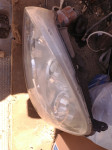 Opel Corsa 2004 luč levo spredaj žaromet leča original