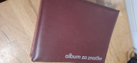 Prodam polni album z zbirateljskimi značkami