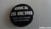 ROCK IS DEAD - LONG LIVE PAPER AND SCISSORS