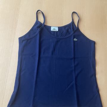 ŽENSKA MAJICA LACOSTE, MODRA, BREZ ROKAVOV, ORIGINAL ŠT. 40
