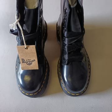 With soles bouncing airwair