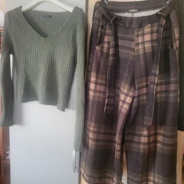 žensko hlačno krilo in pulover