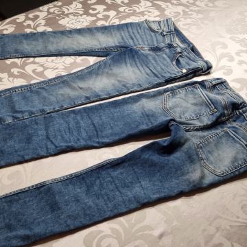 Fantovske kavbojke znamke Skinny št 128 za 7-8 let modre 2 kosa