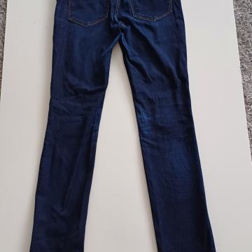 Tommy Hilfiger kavbojke 27/34