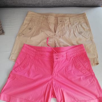 dvoje ženske kratke hlače št. 38
