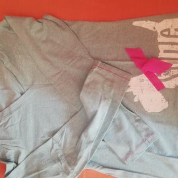 Zgronji del pižame zelene barve