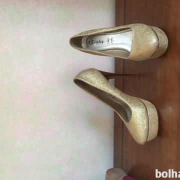 zlati usnjeni salonarji