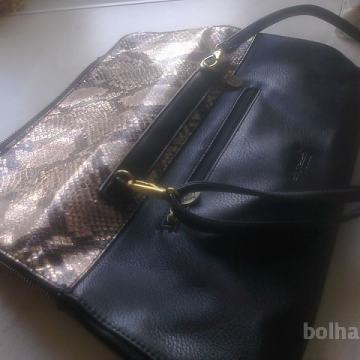 črna torbica z tigrastim dodatkom