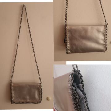 m.dodatki#TORBICA ○elegantna ○z ketnico ●nova