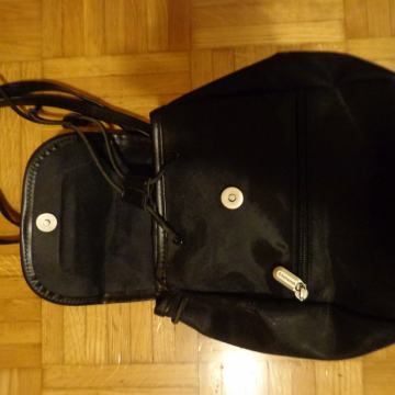 ženski nahrtbnik  črne barve Samsonite