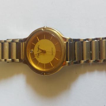 ŽENSKA ROČNA URA QUARTZ CENA 15  EUR  TEL 070 604 547