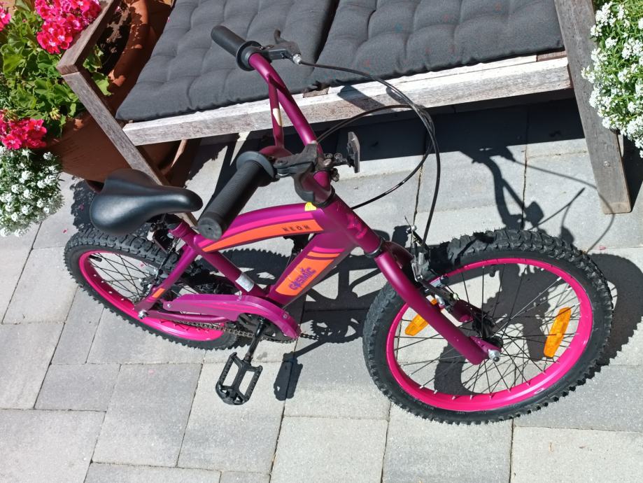 cosmic neon 18 inch bike
