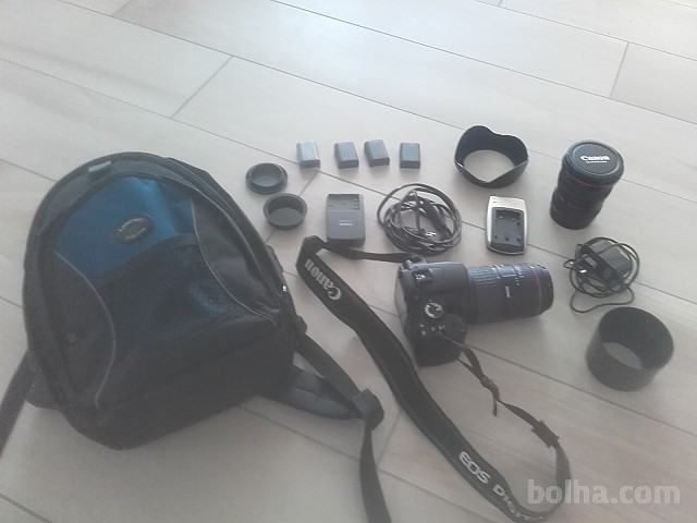 DSLR Canon EOS 400D, body, polnilec, baterije, nahrbtnik